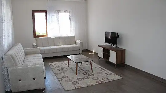 Bakan Kurum, şantiyeye dönen Elazığ'da deprem konutlarını inceledi