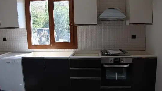 Bakan Kurum, şantiyeye dönen Elazığ'da deprem konutlarını inceledi