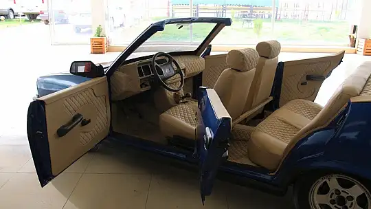 Hurda otomobil, üstü açık lüks otomobile döndü