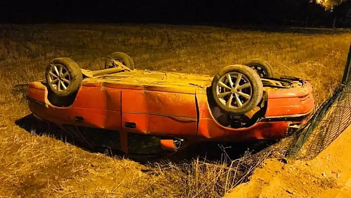 Takla atan otomobilden burnu kanamadan çıktı