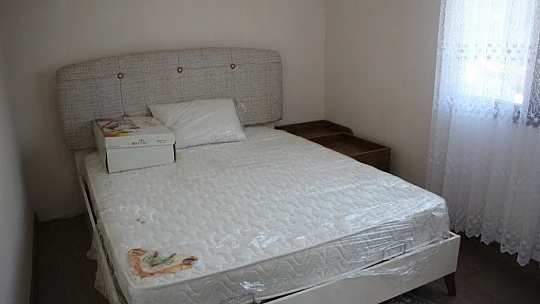Bakan Kurum, şantiyeye dönen Elazığ'da deprem konutlarını inceledi