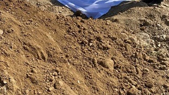 Elazığ'da etrafa saçılan kemikler toplanıp kefenlendikten sonra yeniden defnedildi